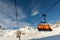 Scenic panoramic view of Silvretta ski area at Iscgl and Samnaun skiing resort with chairlifts , downhill slpoes and clear blue