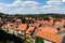 Scenic panoramic view traditional shingle tiled red rooftop old ancient medieval european german small town Quedlinburg