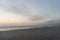 Scenic panoramic Zuma Beach vista after sunset on a foggy day, Malibu, California