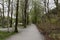 A scenic pedestrian foot path along Eivindsvannet lake in Djupadalen public recreational and hiking area