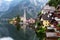 Scenic picture-postcard view of famous historic Hallstatt mountain village with Hallstattersee in the Austrian Alps in mystic