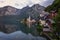 Scenic picture-postcard view of famous historic Hallstatt mountain village with Hallstattersee in the Austrian Alps in mystic