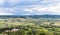 Scenic and picturesque view of Tuscany countryside rolling hills and farmland from above ancient city of Montepulciano