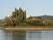 Scenic Rhine River landscape reflected in water seen from european STEIN am RHEIN town in SWITZERLAND