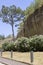 The scenic road among the rocks on the Vomero Hill leading to medieval Castel Sant`Elmo, Naples, Italy