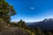 Scenic road to Theth mountain village in warm evening light with moon on the horizon, Albania