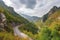 scenic road trip on a mountain highway, with breathtaking views of the mountains and forests