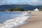 scenic sandy empty coast at Nova Scotia in Canada with view to coastal landscape