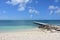 Scenic Seascape with A Dock and Deserted Beach