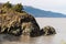 Scenic shot of big rocks on the shore of Turnagain Arm, a part of the Gulf of Alaska in Alaska, USA
