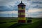 Scenic shot of the famous Pilsum Lighthouse, a sector light for the Ems??orn channel, Germany