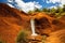 Scenic shot of the red dirt falls in Waimea canyon state park in  Hawaii, USA