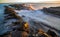 Scenic shot of a rocky beach at Snapper Rocks in Gold Coast, Queensland, Australia during sunrise