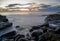 Scenic shot of a rocky beach at Snapper Rocks in Gold Coast, Queensland, Australia during sunrise