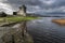 Scenic shot of Ross Castle on shore of Muckross Lake in Killarney National Park in Kerry, Ireland