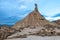 Scenic shot of a sandstone tower created by erosion at the Bardenas Reales in Navarre, Spain