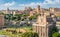 Scenic sight in the Roman Forum, with the Temple of Antonino and Faustina, the Tower of the Militia and the Trajan`s Market. Rome.