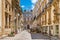 Scenic sight in Trapani old town with the Palazzo Senatorio in the background. Sicily, Italy.