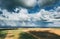 Scenic Sky With Fluffy Clouds On Horizon. Bird's-eye Aerial View. Amazing Natural Dramatic Sky With Rain Clouds