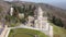 Scenic spring aerial view of Church of St. Nino in monastic complex of Bodbe nunnery on hillside overlooking Alazani