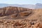 Scenic striped rocks in stone desert