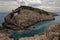 Scenic summer landscape shot in Greece with beautiful cliffs and turquoise sea water