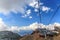 Scenic sunny blue sky landscape of Caucasus mountains with cableway ski lift of Gorky Gorod mountain resort in Sochi