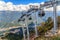 Scenic sunny landscape of Caucasus mountains with cableway ski lift of Gorky Gorod mountain resort in Sochi