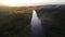 Scenic sunrise at amazon tropical rainforest with vivid fog at the river