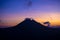 Scenic sunrise and mist at Batur volcano, Kintamani, Bali, Indonesia. Sunrise view of Batur volcano, nature landscape