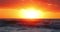 Scenic sunrise or sunset over ocean waves. 4k slow motion video