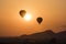 Scenic sunrise with two hot air balloons above Bagan in Myanmar