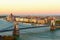 Scenic sunset autumn landscape of Budapest. Picturesque view of Chain Bridge over Danube River and The Hungarian Parliament