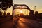 Scenic sunset behind the bridge over the river Weser in Hoya, Germany