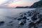 Scenic sunset landscape of rocky Black Sea coast by Bolshoy Utrish village, Anapa, Russia