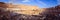 Scenic sunset over the Colosseum. Marble arches ruins over a blue sky, Rome, Italy