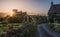 Scenic sunset at St. Barnabas Church in Snowshill, Gloucestershire, England