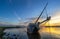 Scenic sunset at a stranded sailing boat near Lemmer, the Netherlands