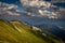 Scenic sunset view from Dambocksteig trek on slope of Rax plateau with idyllic, fresh, green, grassy meadow