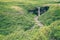 Scenic Svartifoss waterfall view from the trail in summer Iceland