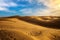 Scenic Thar desert Jaisalmer Rajasthan at sunset with moody sky