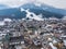 Scenic townscape and snow covered mountain range during winter