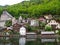 Scenic Traditional Waterfront Houses and Church on the Hallstatt Lake Shore