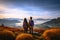 Scenic tranquility Asian couples with backpacks admire mountain landscape view