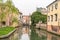 Scenic of treviso town with calnal scene