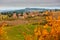 Scenic Tuscan landscape with small village on top of hill