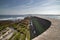 Scenic view from afar of breakwaters in Port Socoa in France on a sunny day