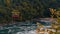 Scenic view of an Air Car with tourists passing over the Whirlpool river in a park