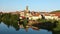 Scenic view of ancient church and houses of Dormans commune at summer day, France