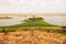 Scenic view of animals grazing at Enkongo Narok Swamp

in Amboseli National Park in Kenya